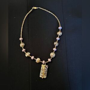 20” Necklace with light purple, gray and black beads.